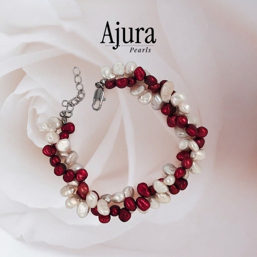 Ajura Pearls dual twisted baroque freshwater pearl bracelet in white and red with silver clasp.