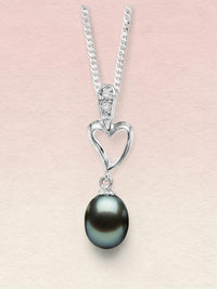 Ajura Pearls black freshwater pearl drop pendant with a white gold heart-shaped bail and cubic zirconia accents.