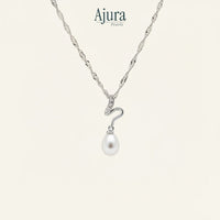 Ajura Pearls Stream Of The Wild pendant with a blue drop freshwater pearl and cubic zirconia detail on a silver chain.