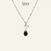 Ajura Pearls blue freshwater drop pearl pendant with cubic zirconia on white gold rhodium plated chain.