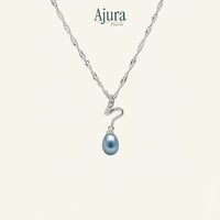 Ajura Pearls Stream of the Wild pendant with a blue freshwater pearl and cubic zirconia detail on a white gold chain.