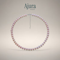 Ajura Pearls classic choker with off-round freshwater pearls in white, peach, and lavender. 6-7mm pearls, 38cm length with extension.