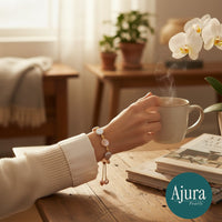 Ajura Pearls bracelet with mixed colour freshwater coin pearls and gold beads, adjustable chain.