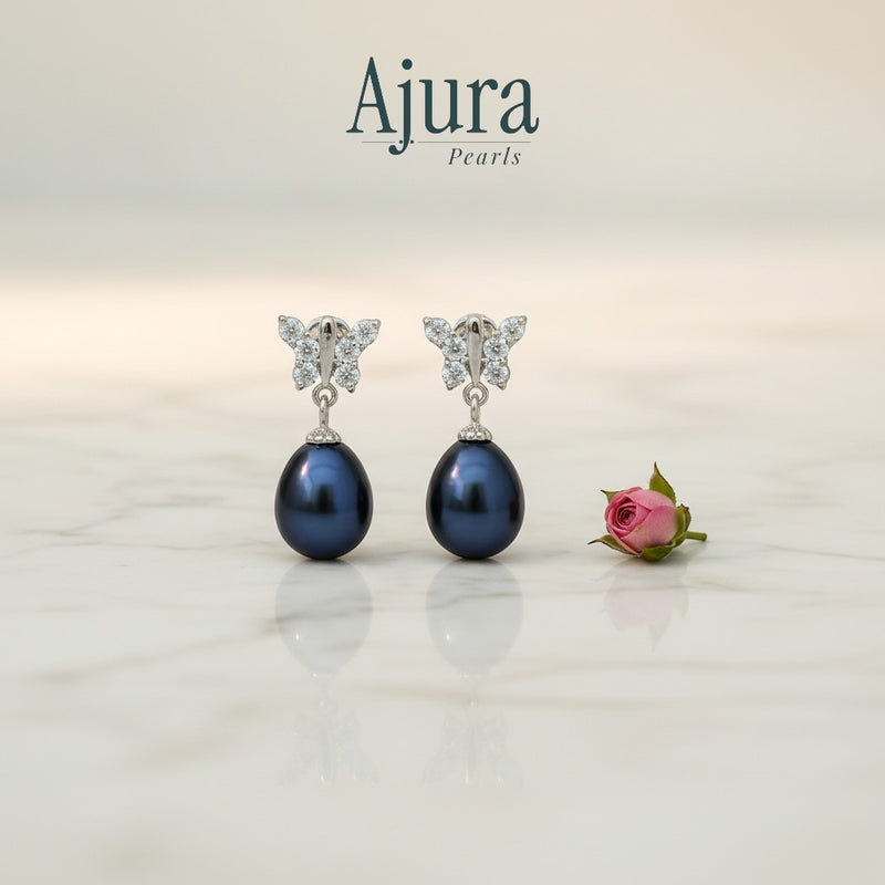 Ajura Pearls dark blue freshwater pearl drop earrings with butterfly motif and cubic zirconia accents.