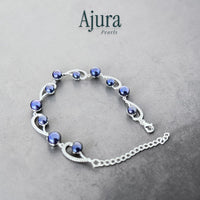 Ajura Pearls dark blue freshwater pearl bracelet with pavé sterling silver accents and adjustable chain.