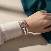 Ajura Pearls dual strand white rice freshwater pearl bracelet with ornate silver clasp. 8.5 inches.