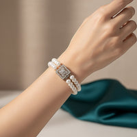 Ajura Pearls dual strand white freshwater pearl bracelet with ornate silver clasp, 8.5 inches.