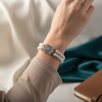 Ajura Pearls dual strand white freshwater rice pearl bracelet with ornate silver clasp, 8.5 inches.