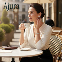 Ajura Pearls floral drop earrings with dark grey freshwater pearls and yellow accent stones, rhodium plated.