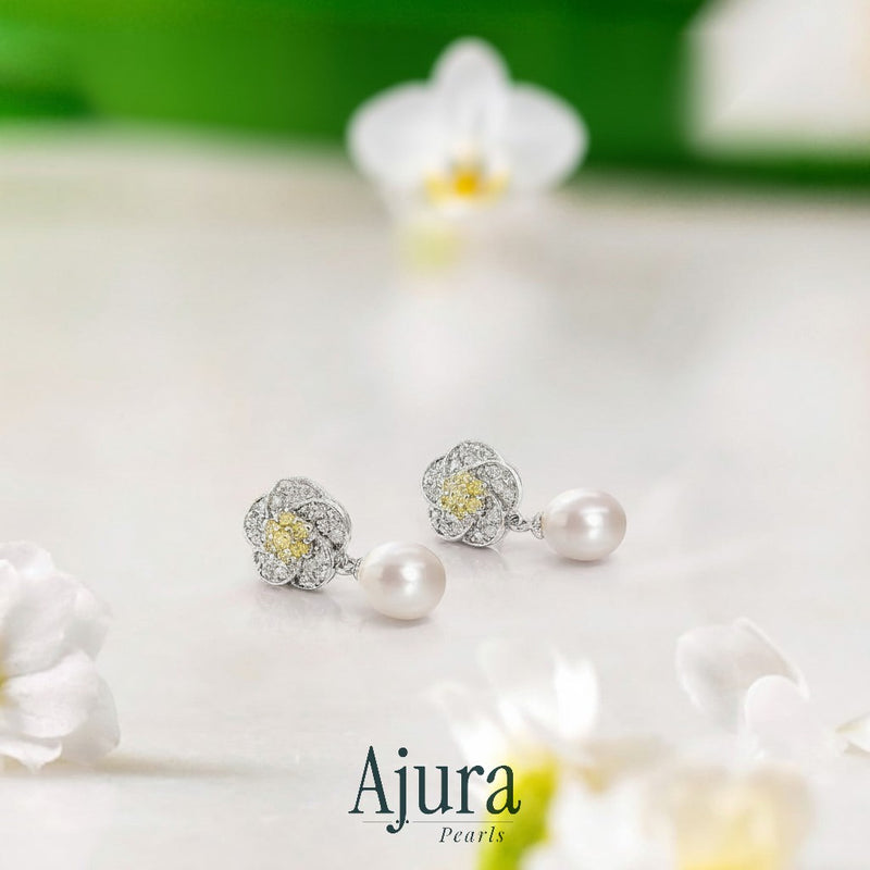 Ajura Pearls white gold rhodium plated flower drop earrings with freshwater pearls and yellow diamonds.