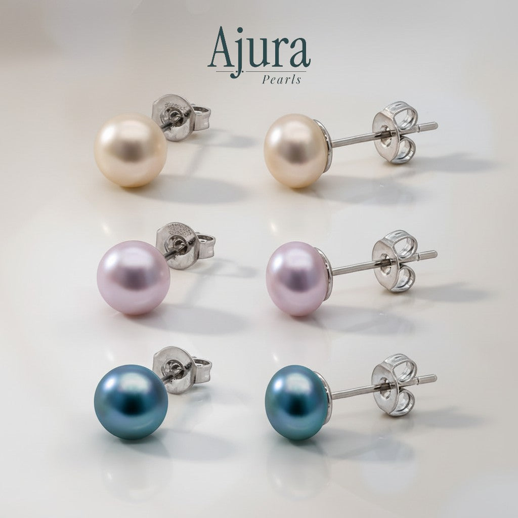 Ajura Pearls 3 pairs of freshwater pearl stud earrings in white, peach, lavender, and black colours.