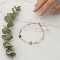 Ajura Pearls gold-plated chain bracelet with freshwater pearls in black, lavender, and white.