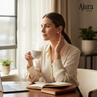 Ajura Pearls gold rhodium plated earrings with white and peach freshwater pearls on link chains.