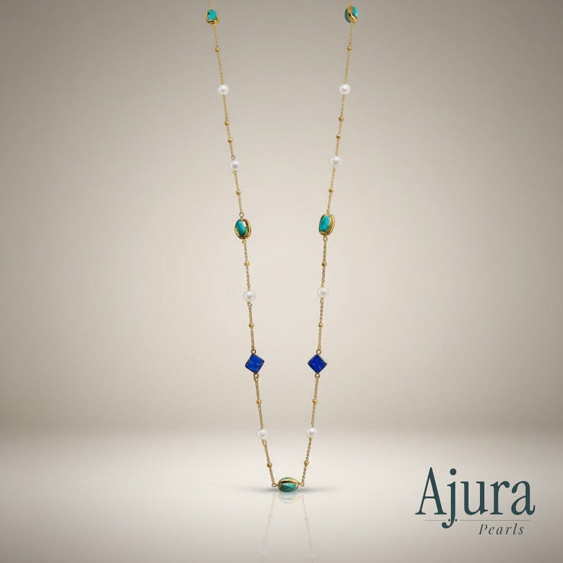 Ajura Pearls long necklace with lapis lazuli, turquoise, and freshwater pearls on a gold chain.