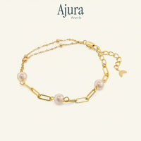 Ajura Pearls minimalist gold-plated chain bracelet with freshwater pearls. Available in peach, lavender, black, or mixed colours.