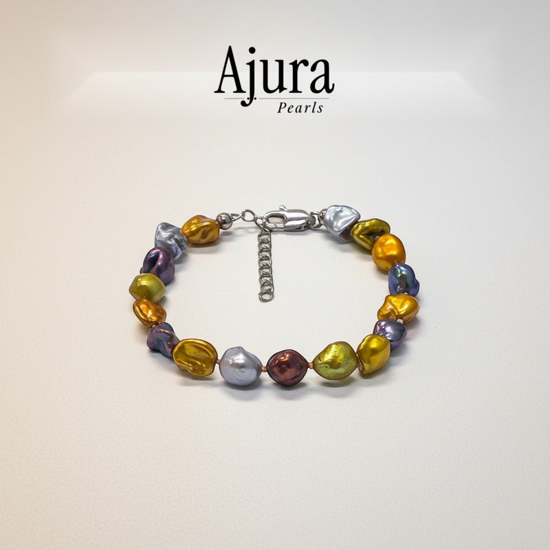 Ajura Pearls multicolor keshi pearl bracelet with unique, luminous, organically shaped pearls and silver clasp.