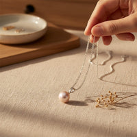 Ajura Pearls 8-9mm round peach freshwater pearl pendant on a 925 sterling silver chain.