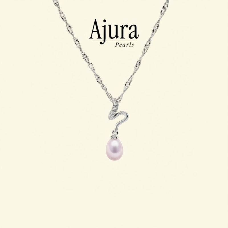 Ajura Pearls Stream Of The Wild pendant with a pink drop freshwater pearl and cubic zirconia accents on a white gold chain.
