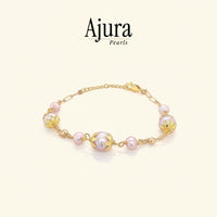 Ajura Pearls delicate pink freshwater potato pearl bracelet with gold-plated accents and adjustable chain.