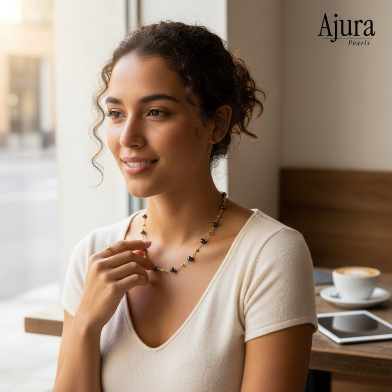 Ajura Pearls gold rhodium plated tin cup necklace with natural freshwater pearls.