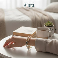 Ajura Pearls triple strand bracelet with freshwater pearls and turquoise accents, gold chain, 6-inch length with extension.