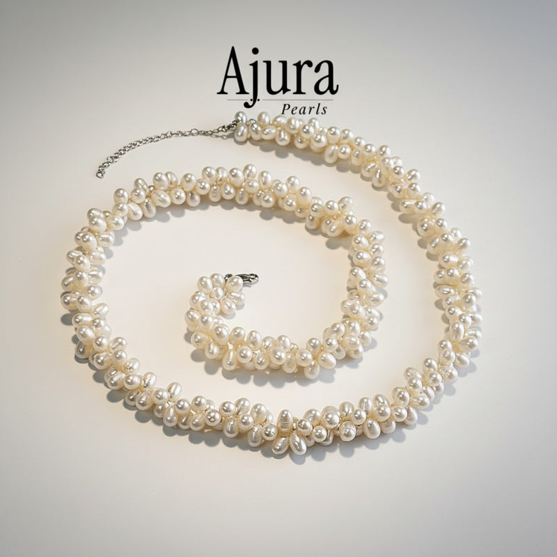 Ajura Pearls natural freshwater rice pearl necklace with a twisted design.