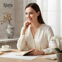 Ajura Pearls white gold rhodium plated pendant with a drop freshwater pearl and cubic zirconia accents.