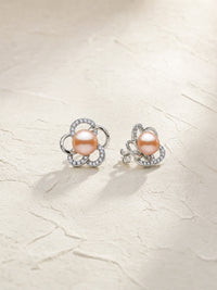 Angel Flower Pearl Studs — light styled detail