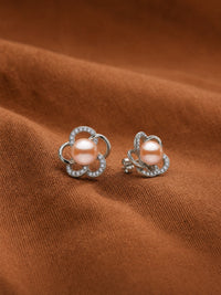Angel Flower Pearl Studs — contrasting styled detail