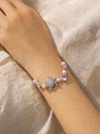 Charm Pearl Bracelet Design 3 — worn for scale