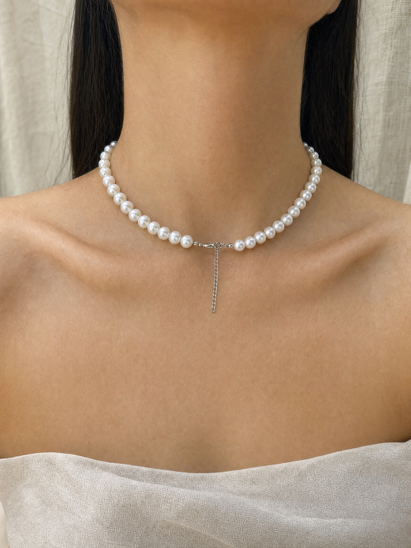 Classic Off Round Pearl Choker — worn for scale