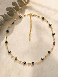 Midnight Muse Tin Cup Pearl Necklace — light styled detail