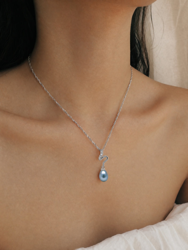 Pearl Pendant – Stream Of The Wild — worn for scale