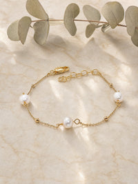 Tin Cup Pearl Bracelet White — light styled detail